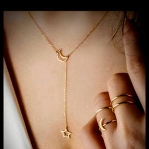 Gold moon and star necklace